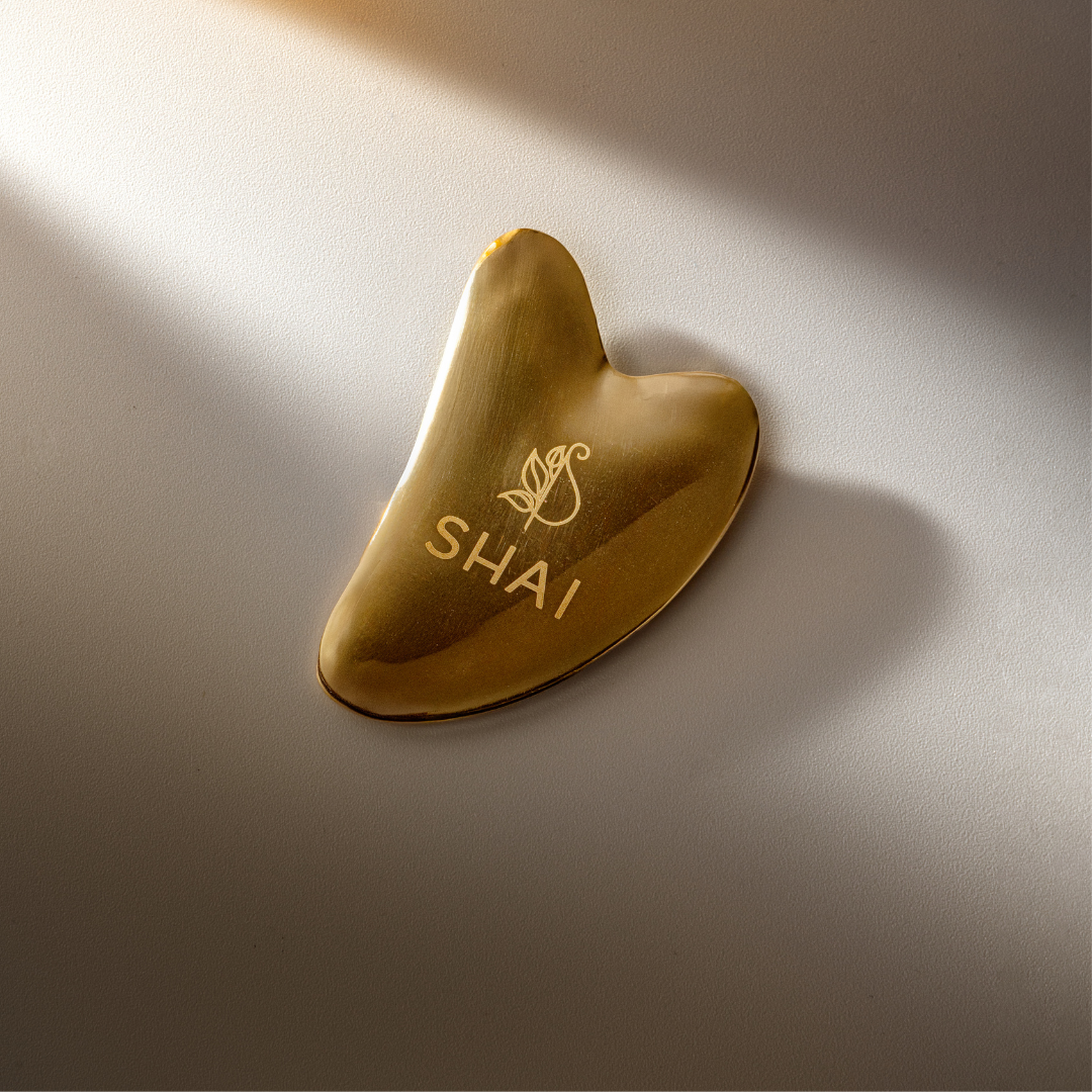 How to Use Kansa Gua Sha for Firmer-Looking Skin
